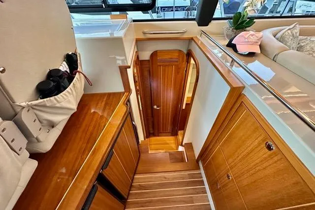 Topcat Yacht Photos Pics Luxurious interior of 2022 Aspen C120 yacht with wooden finishes and elegant design.