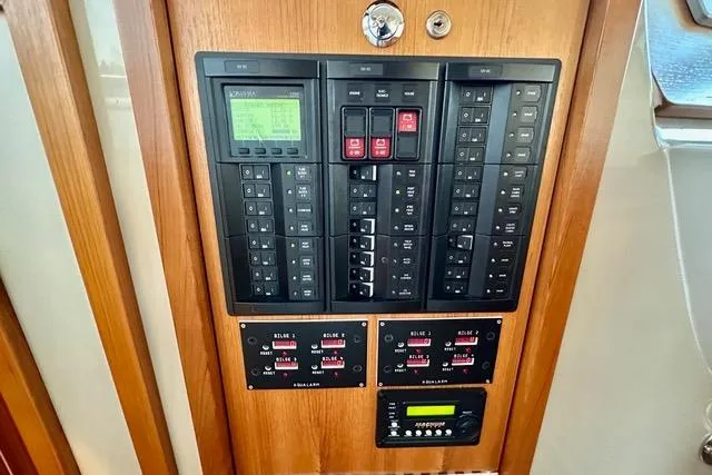 Topcat Yacht Photos Pics Control panel of 2022 Aspen C120 boat with switches and display screen.