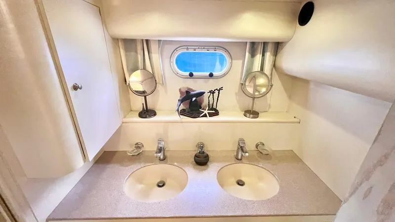  Yacht Photos Pics Bathroom vanity with dual sinks on 1995 Neptunus 58 Flybridge yacht.