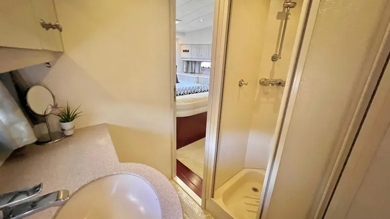  Yacht Photos Pics Bathroom and shower area in 1995 Neptunus 58 Flybridge yacht.
