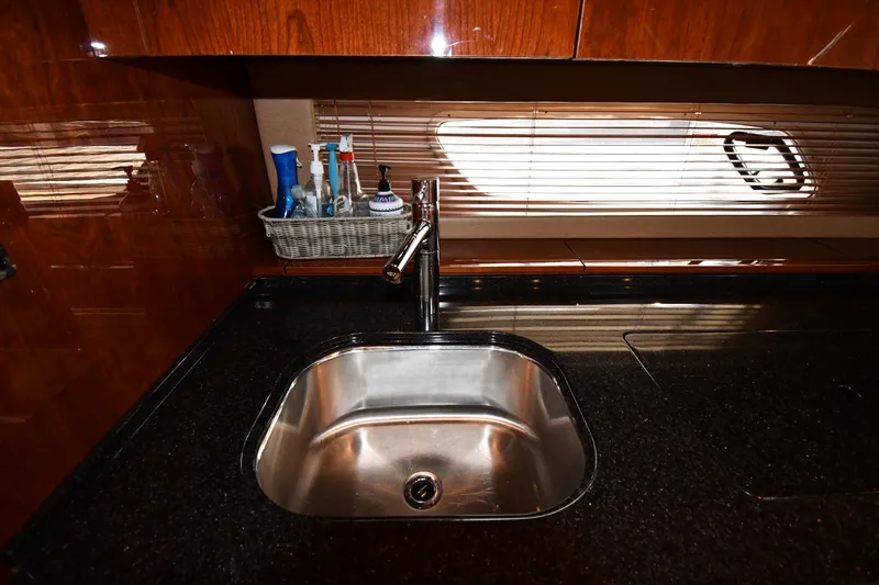 Land Shark Yacht Photos Pics Luxury yacht kitchen sink in 2010 Sea Ray 450 Sundancer with sleek countertop.