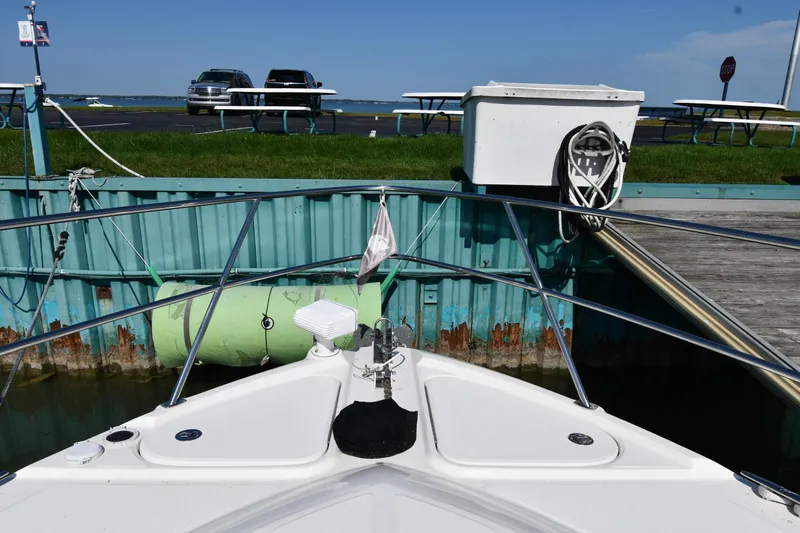 Land Shark Yacht Photos Pics Bow view of 2010 Sea Ray 450 Sundancer docked at marina.