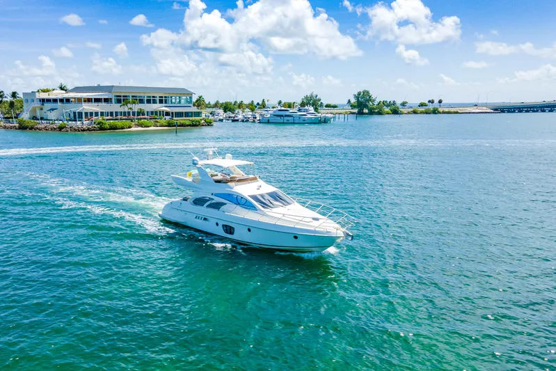  Yacht Photos Pics Azimut 55E yacht cruising on a sunny day, 2005 model.