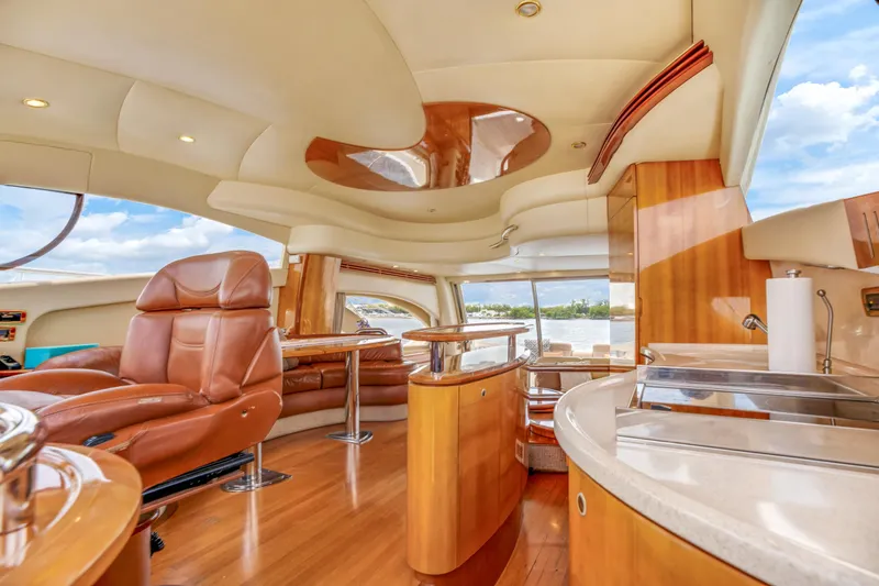  Yacht Photos Pics Luxurious interior of 2005 Azimut 55E yacht with leather seating and modern design.