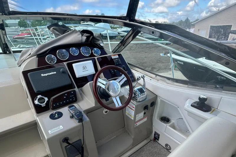 Westwind Yacht Photos Pics 2012 Sea Ray 350 Sundancer helm with modern controls and steering wheel.