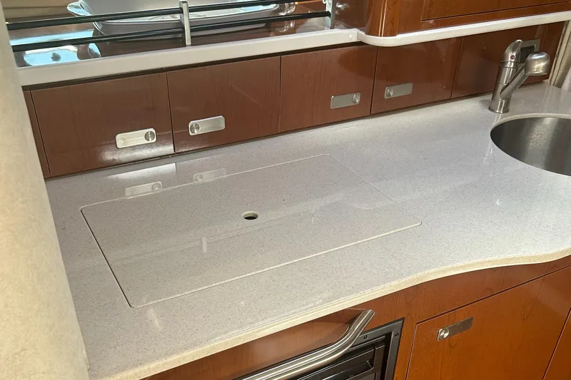 Westwind Yacht Photos Pics Modern kitchen area in a 2012 Sea Ray 350 Sundancer yacht.