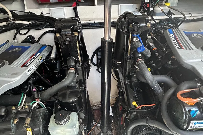 Westwind Yacht Photos Pics Engine compartment of a 2012 Sea Ray 350 Sundancer boat, featuring twin engines.