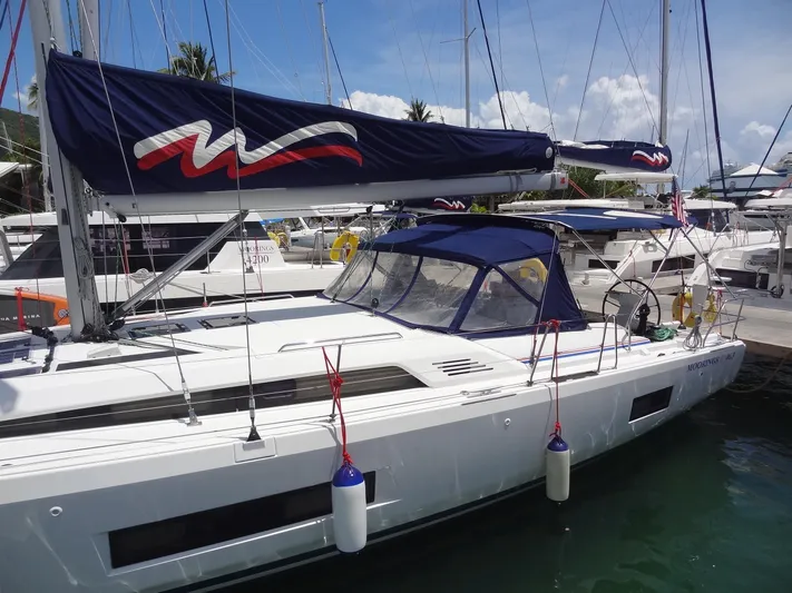 Tabula Rasa Yacht Photos Pics 2020 Beneteau Oceanis 46.1 sailboat docked in a marina.