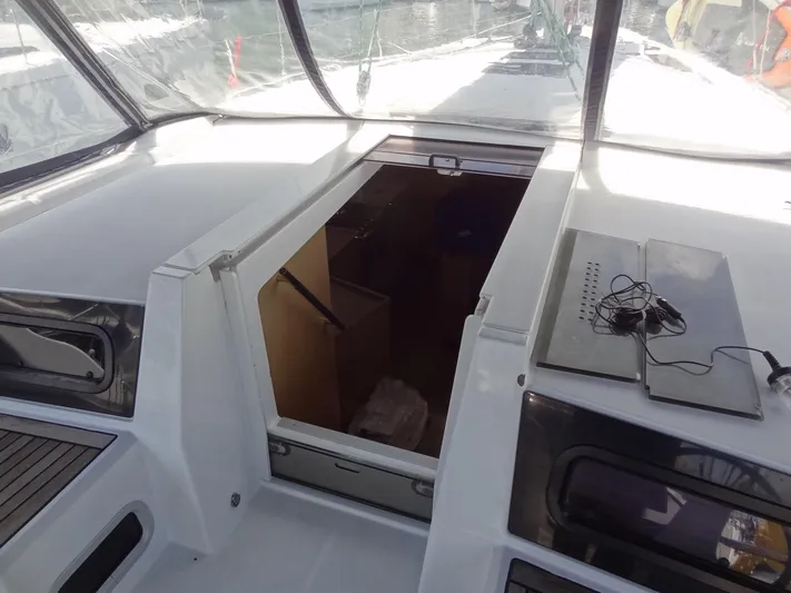 Tabula Rasa Yacht Photos Pics Cockpit view of 2020 Beneteau Oceanis 46.1 sailboat with open hatch.