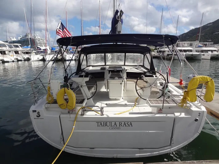 Tabula Rasa Yacht Photos Pics 2020 Beneteau Oceanis 46.1 sailboat docked at marina, rear view.