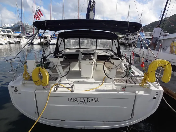 Tabula Rasa Yacht Photos Pics 2020 Beneteau Oceanis 46.1 sailboat docked at marina, rear view.