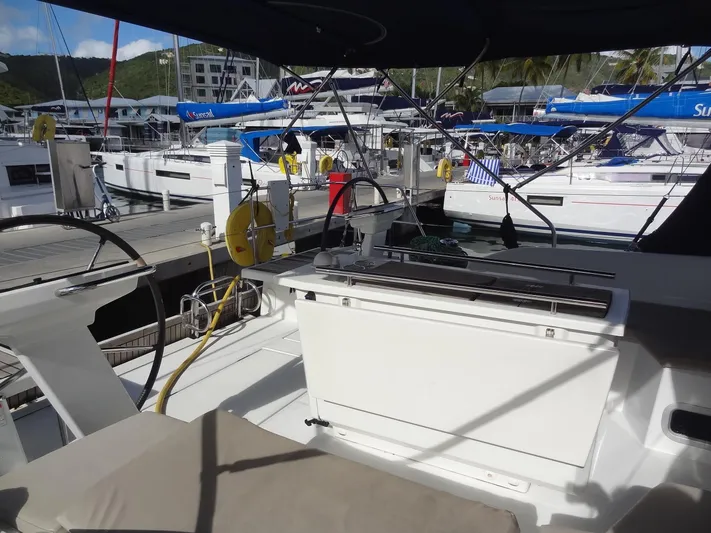 Tabula Rasa Yacht Photos Pics Beneteau Oceanis 46.1 2020 model docked at marina, cockpit view with seating and equipment.