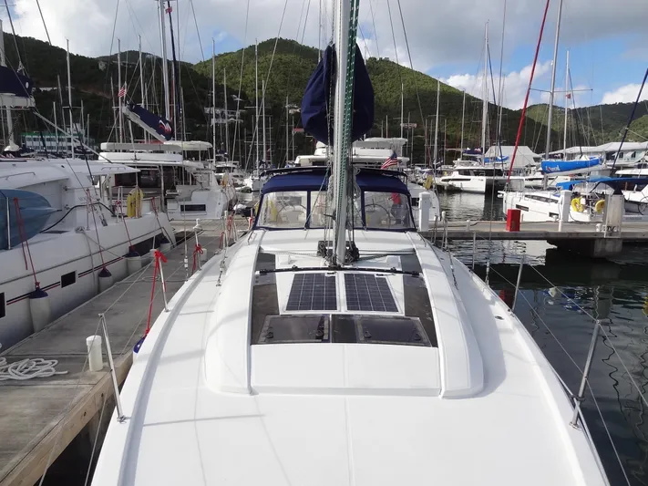 Tabula Rasa Yacht Photos Pics Beneteau Oceanis 46.1 2020 sailboat docked at marina with solar panels on deck.