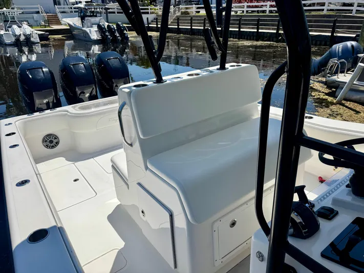  Yacht Photos Pics 2009 Invincible 36 Open Fisherman boat interior with seating and multiple outboard engines.