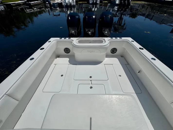  Yacht Photos Pics 2009 Invincible 36 Open Fisherman boat deck with triple outboard engines.