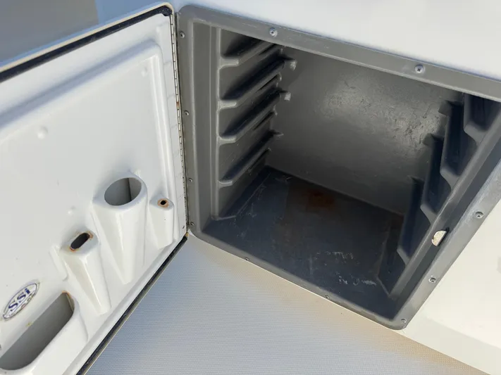  Yacht Photos Pics Open storage compartment on a 2009 Invincible 36 Open Fisherman boat.