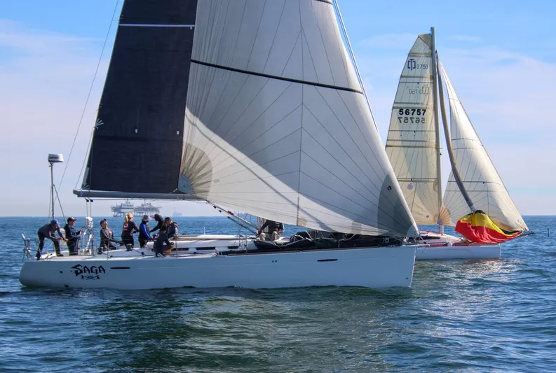 Saga Yacht Photos Pics Sailing race featuring a 2012 Beneteau First 40 yacht on open water.
