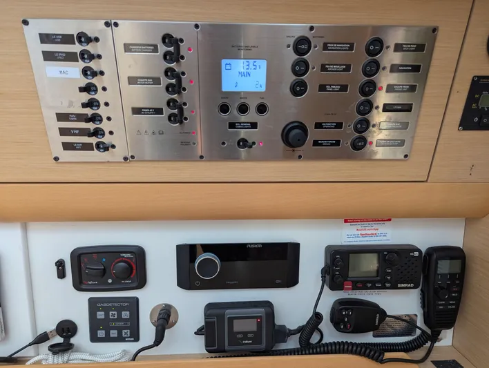 Saga Yacht Photos Pics Control panel of a 2012 Beneteau First 40 sailboat with navigation and communication equipment.