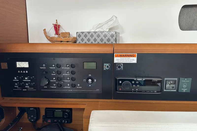 Yacht Photos Pics Control panel of 2018 Jeanneau Sun Odyssey 479 yacht with navigation and audio systems.