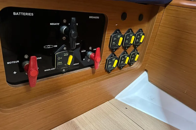 Yacht Photos Pics Control panel of 2018 Jeanneau Sun Odyssey 479 yacht, featuring battery switches and breakers.