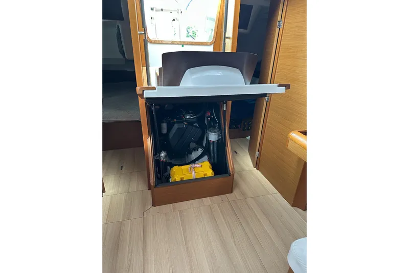  Yacht Photos Pics Engine compartment of 2018 Jeanneau Sun Odyssey 479 sailboat, showcasing interior design.