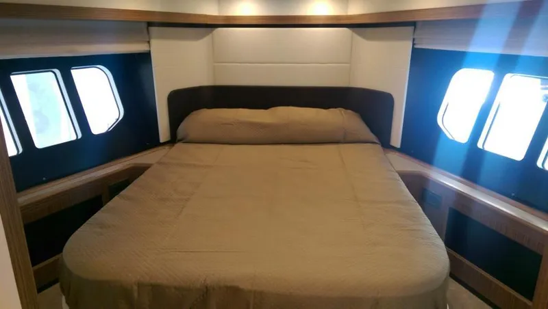  Yacht Photos Pics Luxurious bedroom in 2020 Absolute 50 Fly yacht with large windows and modern design.
