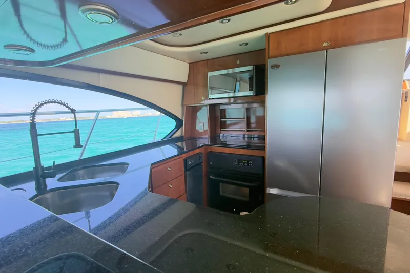 Rubicon Yacht Photos Pics Luxurious kitchen interior of 2008 Meridian 580 Pilothouse yacht with ocean view.
