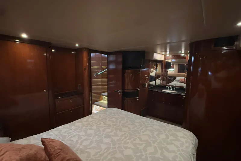 Rubicon Yacht Photos Pics Luxurious interior of 2008 Meridian 580 Pilothouse yacht with elegant wood finishes.