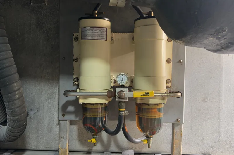 Rubicon Yacht Photos Pics Engine room of 2008 Meridian 580 Pilothouse showing dual diesel fuel filters.