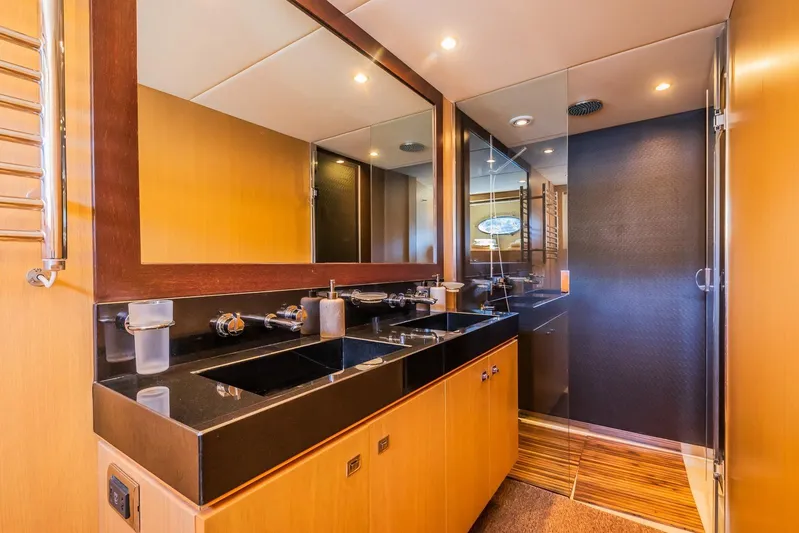 Gitana II Yacht Photos Pics Luxurious bathroom interior of 2009 Princess V78 yacht with modern fixtures and elegant design.