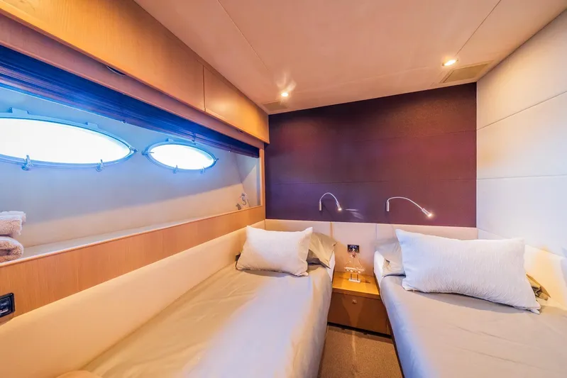 Gitana II Yacht Photos Pics Luxurious twin cabin interior on 2009 Princess V78 yacht with modern design.