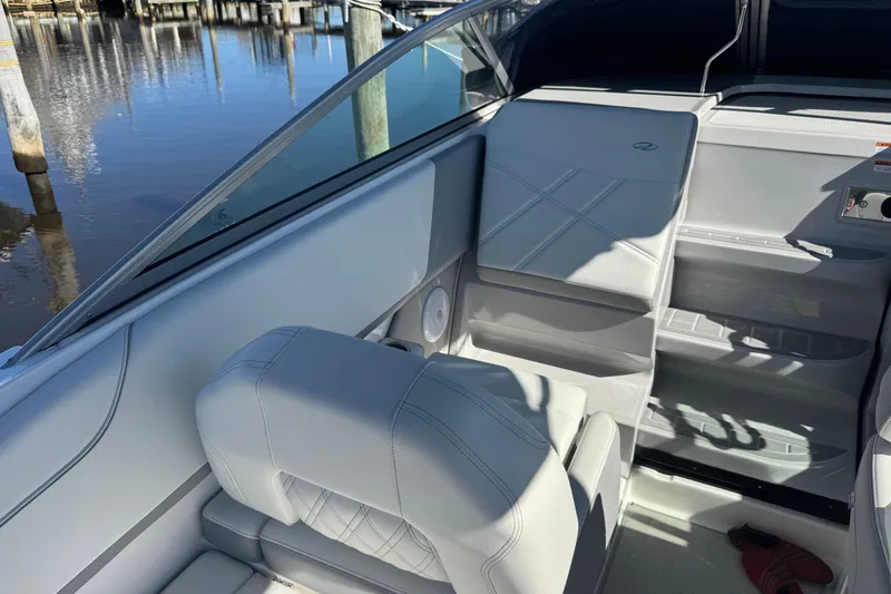 Yacht Photos Pics 2024 Regal 26 XO boat interior with sleek seating and modern design.