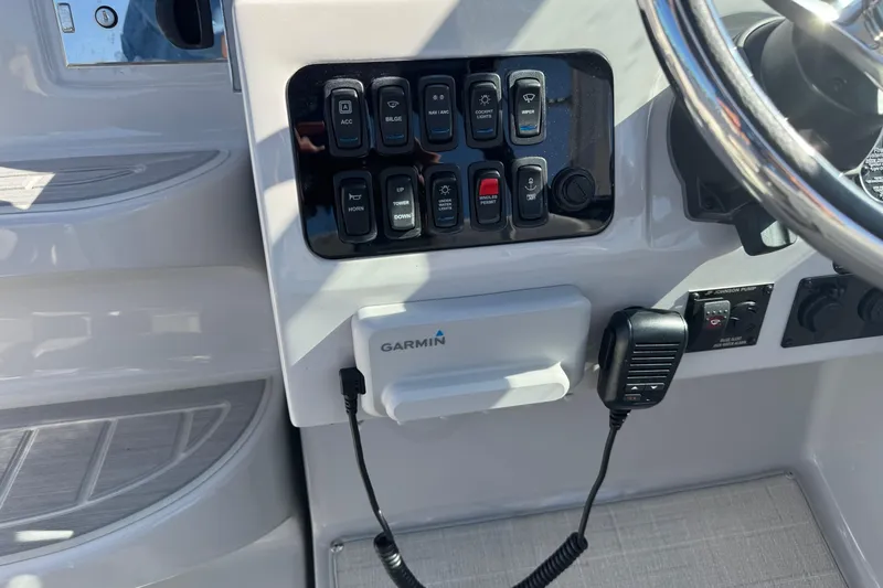  Yacht Photos Pics 2024 Regal 26 XO boat dashboard with Garmin device and control panel.