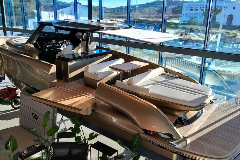  Yacht Photos Pics Luxurious 2026 Solaris Power 44 OPEN ST yacht in showroom, featuring sleek design and spacious deck.