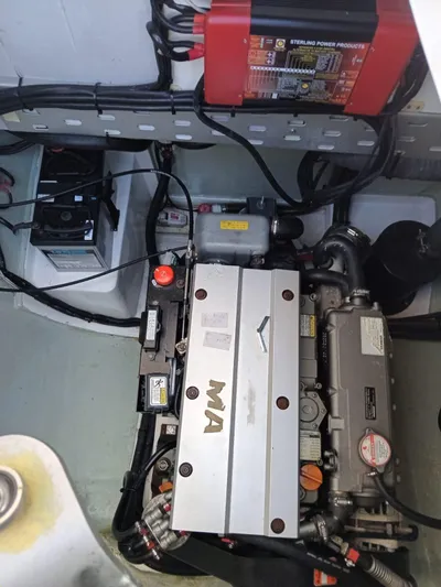 Marylee Yacht Photos Pics Engine compartment of a 2020 Leopard 45 catamaran with visible wiring and components.