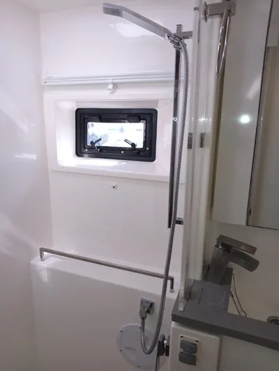 Marylee Yacht Photos Pics Modern bathroom in 2020 Leopard 45 yacht with shower and window.