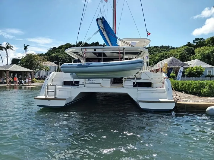 Marylee Yacht Photos Pics Leopard 45 catamaran docked at a marina, 2020 model.