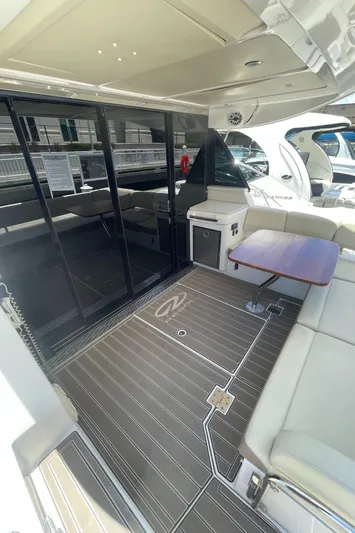 Caribbean Smile Yacht Photos Pics 2019 Regal 42 Grande Coupe yacht with spacious deck and seating area.