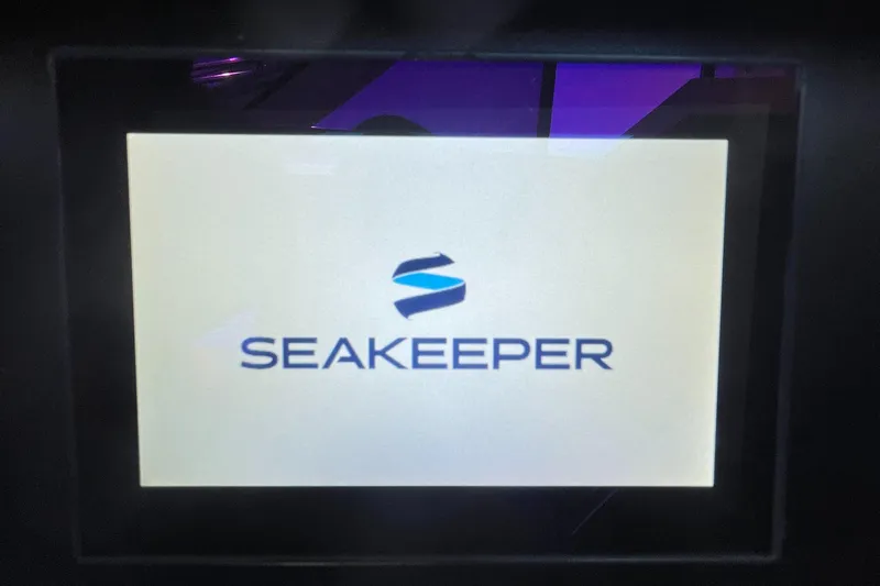 Caribbean Smile Yacht Photos Pics Seakeeper display on 2019 Regal 42 Grande Coupe yacht.