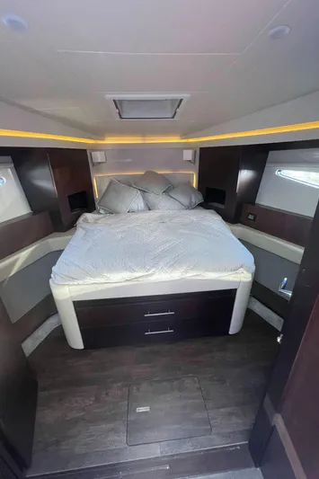 Caribbean Smile Yacht Photos Pics Luxurious bedroom interior of a 2019 Regal 42 Grande Coupe yacht.