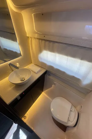 Caribbean Smile Yacht Photos Pics Luxurious bathroom in 2019 Regal 42 Grande Coupe yacht with modern fixtures.