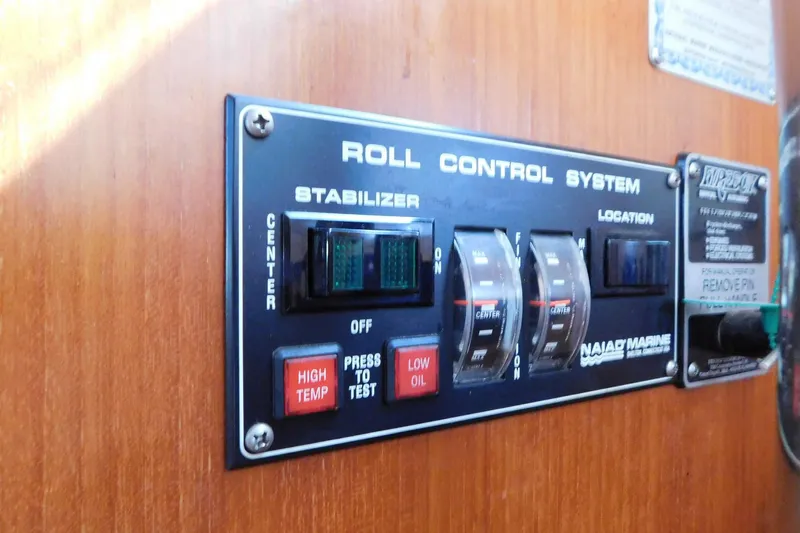 Driftwood Yacht Photos Pics Control panel of 1995 Jefferson 52 Riviana Cockpit MY roll control system.