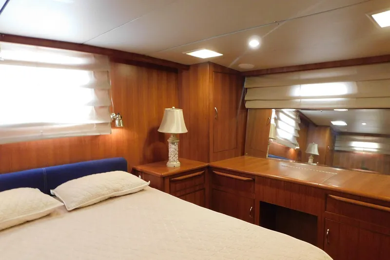 Driftwood Yacht Photos Pics Luxurious cabin interior of 1995 Jefferson 52 Riviana Cockpit MY yacht with wood paneling.