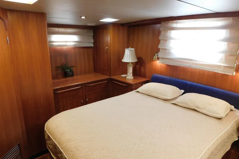 Driftwood Yacht Photos Pics Luxurious bedroom interior of 1995 Jefferson 52 Riviana Cockpit MY yacht.