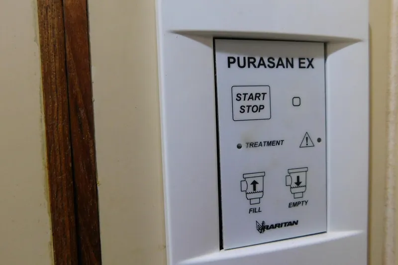 Driftwood Yacht Photos Pics Control panel of Purasan EX system on 1995 Jefferson 52 Riviana Cockpit MY yacht.