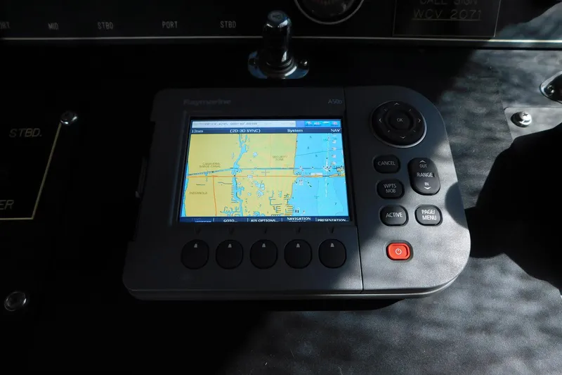 Driftwood Yacht Photos Pics Navigation system on 1995 Jefferson 52 Riviana Cockpit MY boat dashboard.