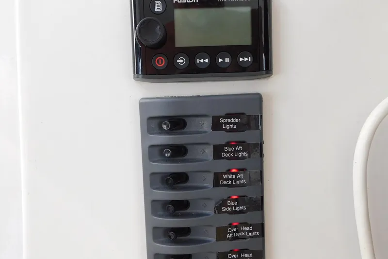 Driftwood Yacht Photos Pics Control panel with switches for deck lights on a 1995 Jefferson 52 Riviana Cockpit MY.