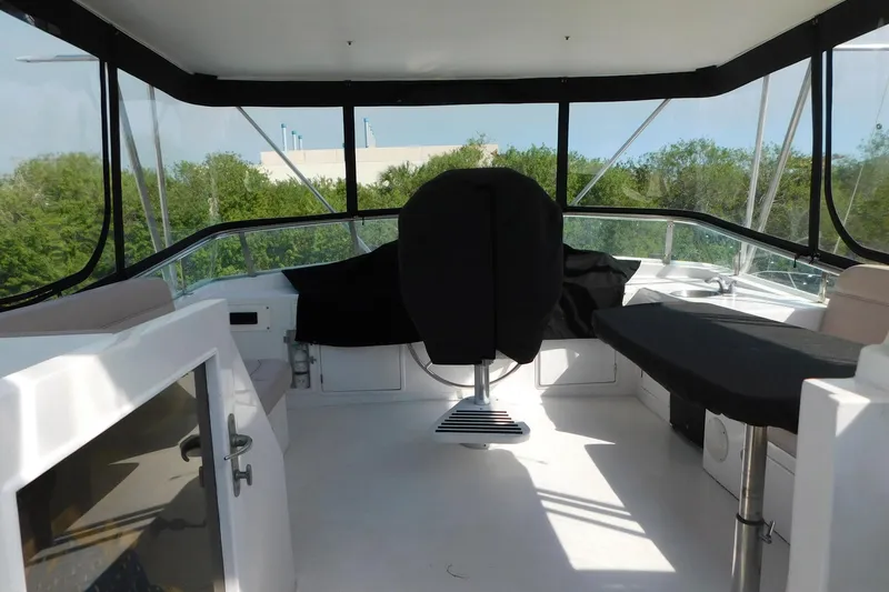 Driftwood Yacht Photos Pics 1995 Jefferson 52 Riviana Cockpit MY interior with helm and seating area.