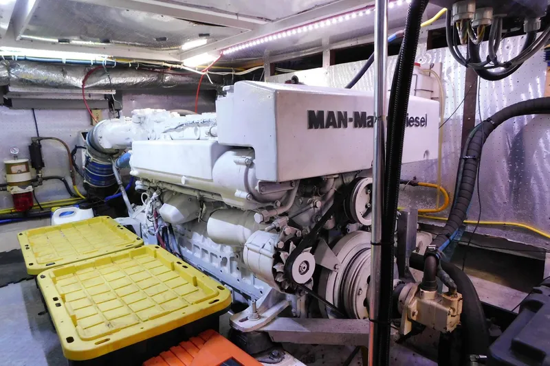 Driftwood Yacht Photos Pics Engine room of a 1995 Jefferson 52 Riviana Cockpit MY with MAN marine diesel engine.