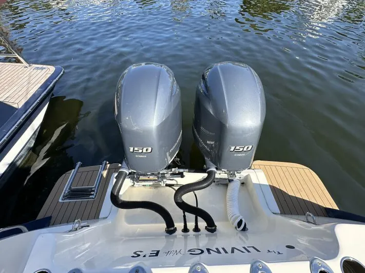 T/t Living With E's Yacht Photos Pics 2018 Scout 255LXF boat with twin Yamaha 150 engines on water.